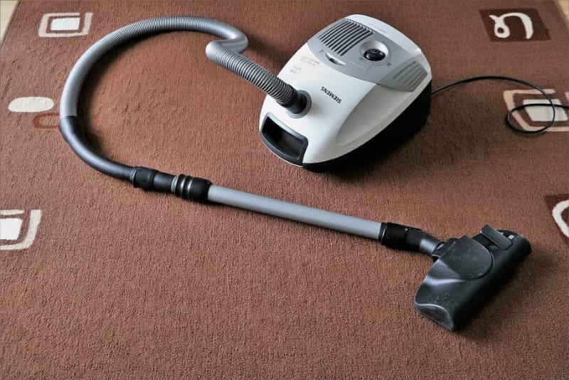 Magic Dry Carpet Cleaning services Perth Vacuum cleaner on carpet